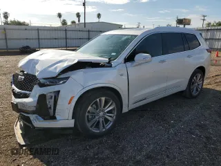 2023 Cadillac XT6 FWD Premium Luxury with VIN 1GYKPCRS5PZ120905, listed as a Copart auction lot 64374254 with 30,694 mi miles and Salvage Title. Bid and sale history available at carsss.com. Image 1.