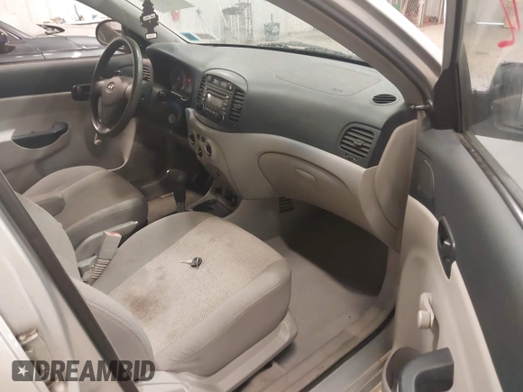 2006 Hyundai Accent GLS with VIN KMHCN46C06U004764, listed as a IAAI auction lot 41793192 with 182,841 mi miles. Bid and sale history available at carsss.com. Image 5.