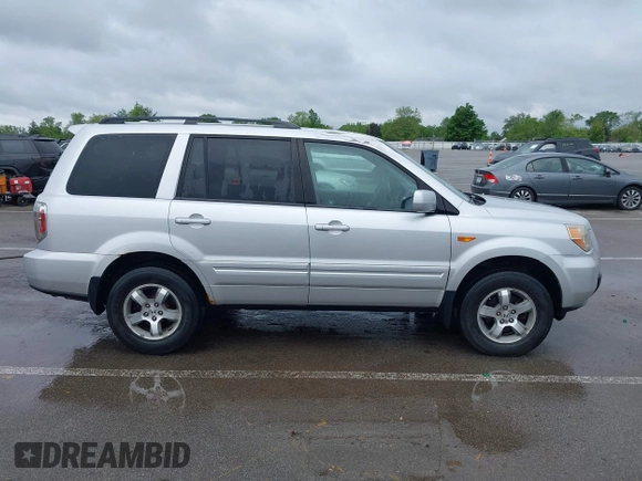 2008 Honda Pilot EX-L with VIN 5FNYF18508B020009, listed as a IAAI auction lot 42321395 with 149,173 mi miles and . Bid and sale history available at DreamBid. Image 13.
