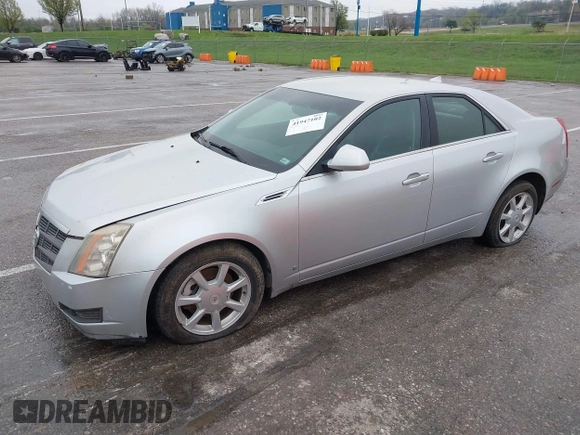 2009 Cadillac CTS AWD w/1SA with VIN 1G6DG577990155465, listed as a IAAI auction lot 41947102 with 1 mi miles. Bid and sale history available at carsss.com. Image 2.