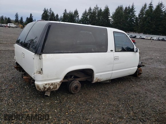1997 Chevrolet Tahoe z VIN 3GNEC18R7VG122449, wystawiony jako Copart lot #85718304 z przebiegiem Nie podano mil oraz Szkoda całkowita • Salvage title. Historia ofert i sprzedaży dostępna na DreamBid. Obrazek 3.