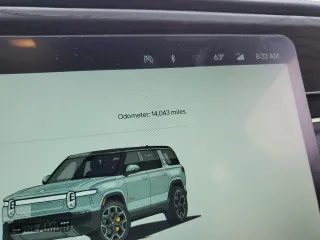 2023 Rivian R1S Adventure with VIN 7PDSGABA4PN011024, listed as a Copart auction lot 72703154 with 14,043 mi miles and Salvage Title. Bid and sale history available at carsss.com. Image 9.