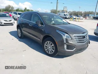 2019 Cadillac XT5 FWD with VIN 1GYKNARS5KZ143510, listed as a IAAI auction lot 41553279 with 53,943 mi miles and . Bid and sale history available at carsss.com. Image 1.