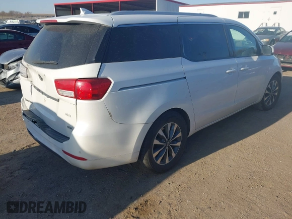2015 Kia Sedona EX with VIN KNDMC5C12F6034991, listed as a IAAI auction lot 41971340 with 148,231 mi miles. Bid and sale history available at carsss.com. Image 4.