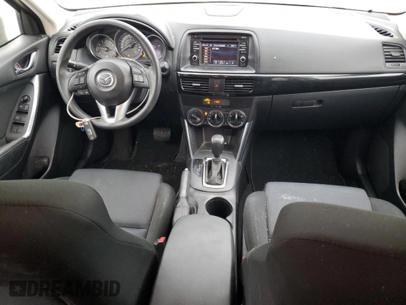 2015 Mazda CX-5 Sport with VIN JM3KE4BEXF0499688, listed as a Copart auction lot 88988095 with 258,460 mi miles and Salvage title. Bid and sale history available at DreamBid. Image 8.