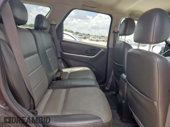 2004 Ford Escape XLT z VIN 1FMYU03124KB41332, wystawiony jako Copart lot #62335725 z przebiegiem Nie podano mil oraz Czysty tytuł • Clean title. Historia ofert i sprzedaży dostępna na DreamBid. Obrazek 11.