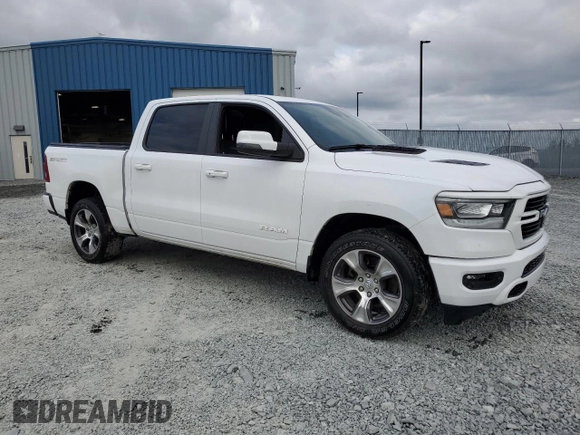 2023 Ram 1500 with VIN C6RREJT3PN534875, listed as a Copart auction lot 72897884 with 32,062 mi miles and Salvage title. Bid and sale history available at DreamBid. Image 4.