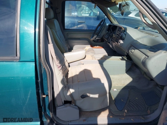1996 GMC Suburban with VIN 1GDEC16R5TJ742543, listed as a IAAI auction lot 41910103 with 159,469 mi miles. Bid and sale history available at carsss.com. Image 5.