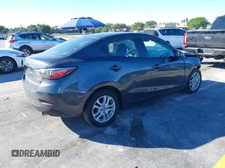 2016 Scion iA with VIN 3MYDLBZV5GY142378, listed as a IAAI auction lot 41274960 with 123,807 mi miles. Bid and sale history available at carsss.com. Image 4.