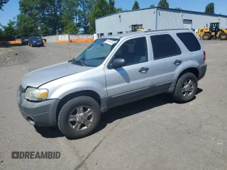 2005 Ford Escape XLS Value with VIN 1FMYU92Z55KC93604, listed as a Copart auction lot 60104145 with 86,788 mi miles and Salvage title. Bid and sale history available at DreamBid. Image 1.