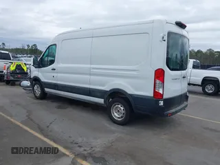 2021 Ford Transit Cargo with VIN 1FTBR1C85MKA12810, listed as a IAAI auction lot 41610132 with 105,724 mi miles and . Bid and sale history available at DreamBid. Image 3.