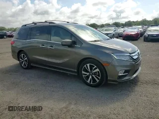 2019 Honda Odyssey Elite z VIN 5FNRL6H90KB027207, wystawiony jako Copart lot #60265905 z przebiegiem 69 313 mil mil oraz Szkoda całkowita • Salvage title. Historia ofert i sprzedaży dostępna na DreamBid. Obrazek 14.