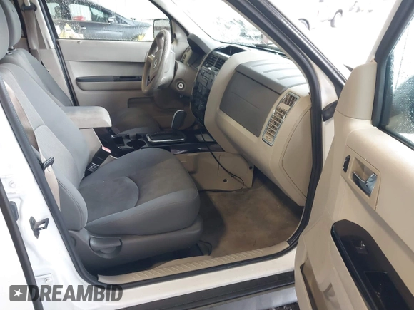 2008 Mazda Tribute ES with VIN 4F2CZ06148KM13459, listed as a IAAI auction lot 41742402 with 196,030 mi miles and . Bid and sale history available at DreamBid. Image 5.