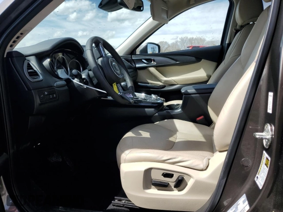 2017 Mazda CX-9 Touring with VIN JM3TCACY7H0127925, listed as a Copart auction lot 49811645 with 100,954 mi miles and Salvage title. Bid and sale history available at DreamBid. Image 7.