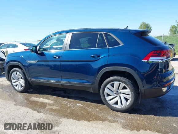 2021 Volkswagen Atlas SE z VIN 1V2KE2CA7MC220524, wystawiony jako IAAI lot #42017287 z przebiegiem 29 380 mil mil oraz . Historia ofert i sprzedaży dostępna na DreamBid. Obrazek 14.