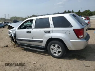 2005 Jeep Grand Cherokee Laredo z VIN 1J4GR48KX5C581833, wystawiony jako Copart lot #60975355 z przebiegiem 149 993 mil mil oraz Szkoda całkowita • Salvage title. Historia ofert i sprzedaży dostępna na DreamBid. Obrazek 2.