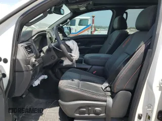 2021 Nissan Titan Pro-4X z VIN 1N6AA1ED0MN533801, wystawiony jako Copart lot #53301215 z przebiegiem 41 991 mil mil oraz Szkoda całkowita • Salvage title. Historia ofert i sprzedaży dostępna na DreamBid. Obrazek 7.