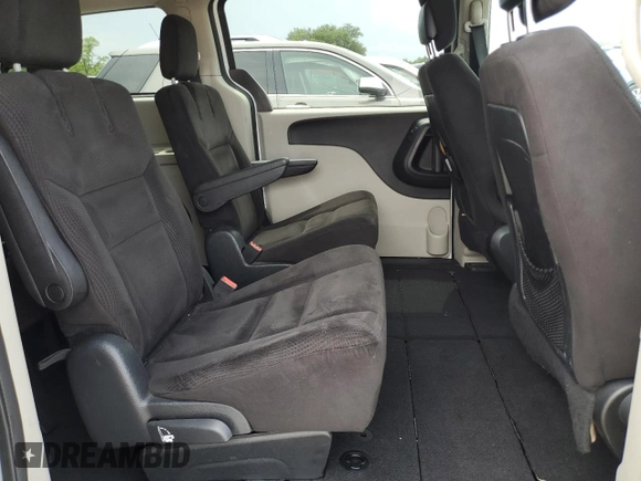 2014 Dodge Grand Caravan SXT z VIN 2C4RDGCG7ER214087, wystawiony jako Copart lot #61096815 z przebiegiem 131 241 mil mil oraz Czysty tytuł • Clean title. Historia ofert i sprzedaży dostępna na DreamBid. Obrazek 11.