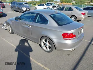 2011 BMW 1 Series 128i with VIN WBAUP7C53BVP21588, listed as a IAAI auction lot 41484300 with 52,124 mi miles. Bid and sale history available at carsss.com. Image 3.