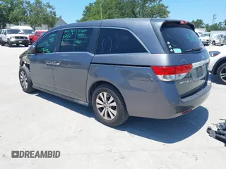 2014 Honda Odyssey EX-L z VIN 5FNRL5H69EB095297, wystawiony jako IAAI lot #42299438 z przebiegiem 126 841 mil mil oraz . Historia ofert i sprzedaży dostępna na DreamBid. Obrazek 3.