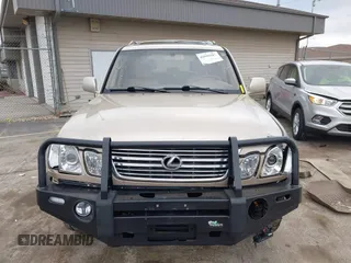 1999 Lexus LX 470 z VIN JT6HT00W8X0045705, wystawiony jako IAAI lot #42005587 z przebiegiem 443 758 mil mil oraz . Historia ofert i sprzedaży dostępna na DreamBid. Obrazek 12.