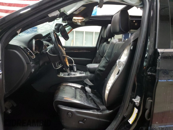 2020 Jeep Grand Cherokee Overland with VIN 1C4RJFCG0LC136132, listed as a Copart auction lot 45793435 with 66,491 mi miles and Salvage Title. Bid and sale history available at DreamBid. Image 7.