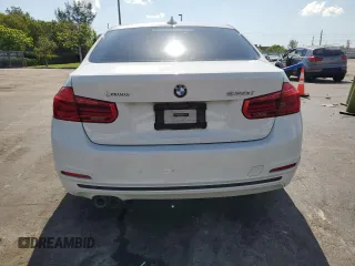 2018 BMW 3 Series 330i with VIN WBA8B9C58JEE80964, listed as a Copart auction lot 57103285 with 188,488 mi miles and Salvage title. Bid and sale history available at DreamBid. Image 6.