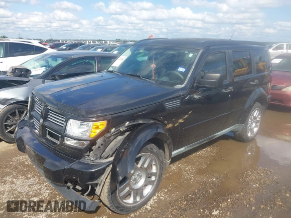 2011 Dodge Nitro Heat with VIN 1D4PT4GK7BW602014, listed as a IAAI auction lot 42371556 with 143,986 mi miles and . Bid and sale history available at DreamBid. Image 2.