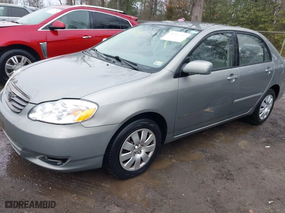 2003 Toyota Corolla CE with VIN JTDBR32E732016827, listed as a IAAI auction lot 41545055 with 140,845 mi miles. Bid and sale history available at carsss.com. Image 17.