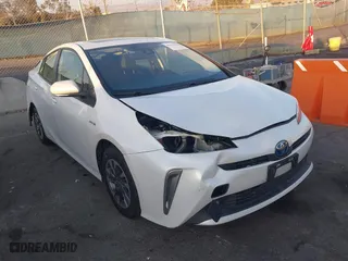 2022 Toyota Prius L Eco with VIN JTDKAMFU1N3181302, listed as a IAAI auction lot 41412650 with 92,397 mi miles. Bid and sale history available at carsss.com. Image 1.