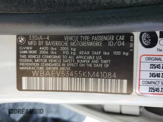 2005 BMW 3 Series 330i with VIN WBAEV53455KM41084, listed as a Copart auction lot 50338425 with 223,116 mi miles and Salvage title. Bid and sale history available at DreamBid. Image 12.