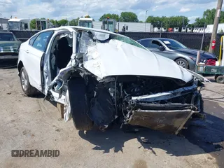 2018 Ford Fusion SE z VIN 3FA6P0H71JR131338, wystawiony jako IAAI lot #39518591 z przebiegiem 113 488 mil mil oraz . Historia ofert i sprzedaży dostępna na DreamBid. Obrazek 1.