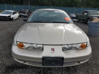 2001 Saturn SL z VIN 1G8ZG52851Z213567, wystawiony jako Copart lot #51795795 z przebiegiem Nie podano mil oraz Szkoda całkowita • Salvage title. Historia ofert i sprzedaży dostępna na DreamBid. Obrazek 5.