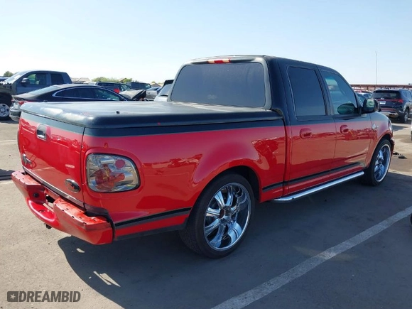 2001 Ford F-150 SuperCrew XLT with VIN 1FTRW07L51KB10800, listed as a IAAI auction lot 41987752 with 199,314 mi miles. Bid and sale history available at carsss.com. Image 4.