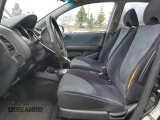 2007 Honda Fit z VIN JHMGD38457S012962, wystawiony jako Copart lot #55927755 z przebiegiem 172 153 mil mil oraz Szkoda całkowita • Salvage title. Historia ofert i sprzedaży dostępna na DreamBid. Obrazek 7.