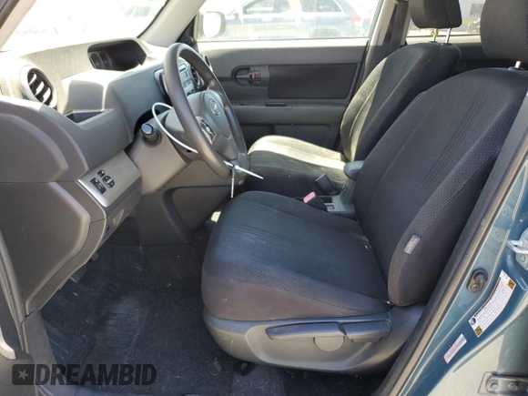 2008 Scion xB z VIN JTLKE50EX81009592, wystawiony jako Copart lot #57913275 z przebiegiem 130 000 mil mil oraz Szkody całkowita. Historia ofert i sprzedaży dostępna na DreamBid. Obrazek 7.