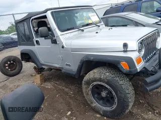 2004 Jeep Wrangler Sport with VIN 1J4FA49S44P772575, listed as a IAAI auction lot 42512876 with 226,387 mi miles and . Bid and sale history available at DreamBid. Image 14.