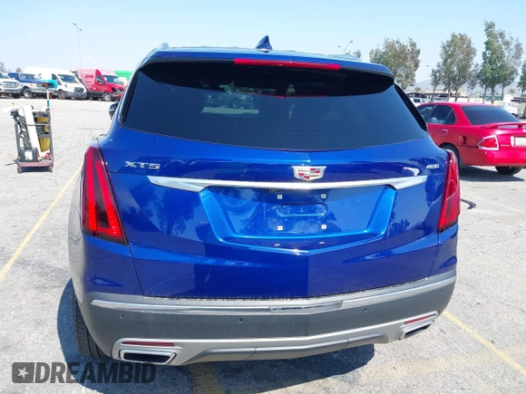 2023 Cadillac XT5 FWD Premium Luxury z VIN 1GYKNCRS3PZ176654, wystawiony jako IAAI lot #42136259 z przebiegiem 20 403 mil mil oraz . Historia ofert i sprzedaży dostępna na DreamBid. Obrazek 17.