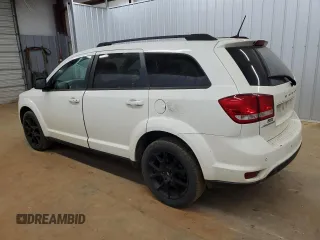 2019 Dodge Journey SE with VIN 3C4PDCBG2KT873270, listed as a Copart auction lot 49467165 with 123,325 mi miles and Clean Title. Bid and sale history available at DreamBid. Image 2.
