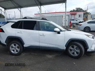 2019 Toyota RAV4 XLE with VIN 2T3W1RFV5KW051023, listed as a IAAI auction lot 40970612 with 106,359 mi miles and . Bid and sale history available at DreamBid. Image 12.