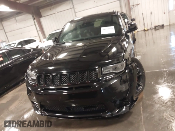2017 Jeep Grand Cherokee SRT with VIN 1C4RJFDJ9HC739324, listed as a IAAI auction lot 40898998 with 92,547 mi miles. Bid and sale history available at carsss.com. Image 12.