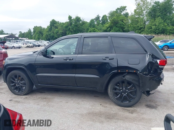 2020 Jeep Grand Cherokee Laredo E with VIN 1C4RJFAG9LC335473, listed as a IAAI auction lot 42366691 with 95,805 mi miles and . Bid and sale history available at DreamBid. Image 14.
