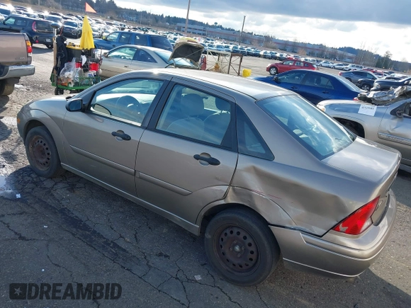 2004 Ford Focus SE with VIN 1FAFP34354W167961, listed as a IAAI auction lot 41545304 with 128,560 mi miles and . Bid and sale history available at DreamBid. Image 3.