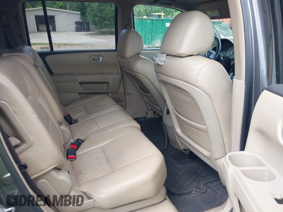 2009 Honda Pilot EX with VIN 5FNYF48489B008698, listed as a IAAI auction lot 42175230 with 268,560 mi miles and . Bid and sale history available at DreamBid. Image 8.