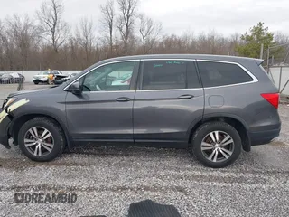 2017 Honda Pilot EX-L with VIN 5FNYF6H59HB029160, listed as a IAAI auction lot 41557192 with 157,153 mi miles and . Bid and sale history available at DreamBid. Image 15.