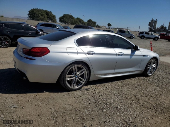 2013 BMW 6 Series 640i with VIN WBA6A0C5XDDZ03833, listed as a Copart auction lot 73165704 with 77,471 mi miles and Salvage Title. Bid and sale history available at carsss.com. Image 3.