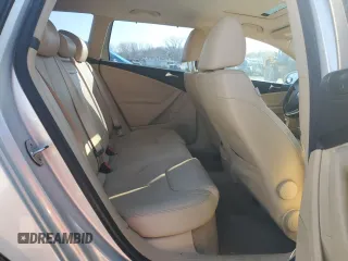 2009 Volkswagen Passat z VIN WVWXK73C99E046868, wystawiony jako Copart lot #79549784 z przebiegiem 167 784 mil mil oraz Szkoda całkowita • Salvage title. Historia ofert i sprzedaży dostępna na DreamBid. Obrazek 10.