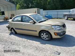 2009 Kia Rio LX with VIN KNADE223996521831, listed as a Copart auction lot 69126284 with 183,796 mi miles and Salvage Title. Bid and sale history available at DreamBid. Image 11.