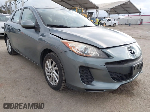 2012 Mazda Mazda3 i Touring with VIN JM1BL1L84C1671872, listed as a IAAI auction lot 42116842 with 85,343 mi miles. Bid and sale history available at carsss.com. Image 1.