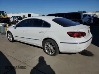 2016 Volkswagen CC Sport with VIN WVWBP7AN4GE511621, listed as a Copart auction lot 69490313 with 137,466 mi miles. Bid and sale history available at carsss.com. Image 2.